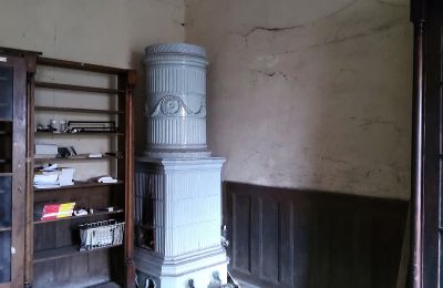 Zámok na predaj Dobrocin, Pałac w Dobrocinie, województwo warmińsko-mazurskie, Kachľová pec